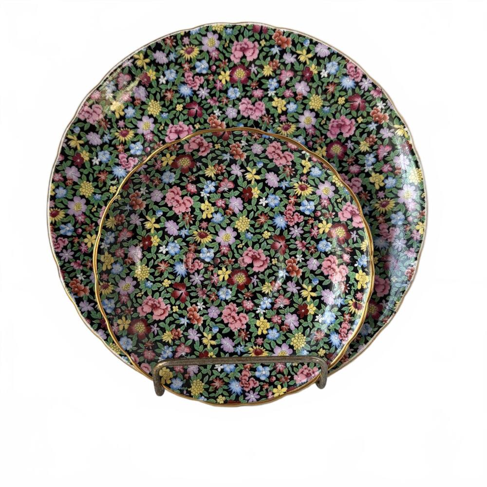 Tuscan China 'Mille Fleurs' black floral decorative plates.